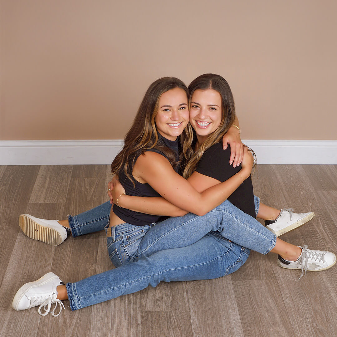 Two women embracing for a best friend photoshoot