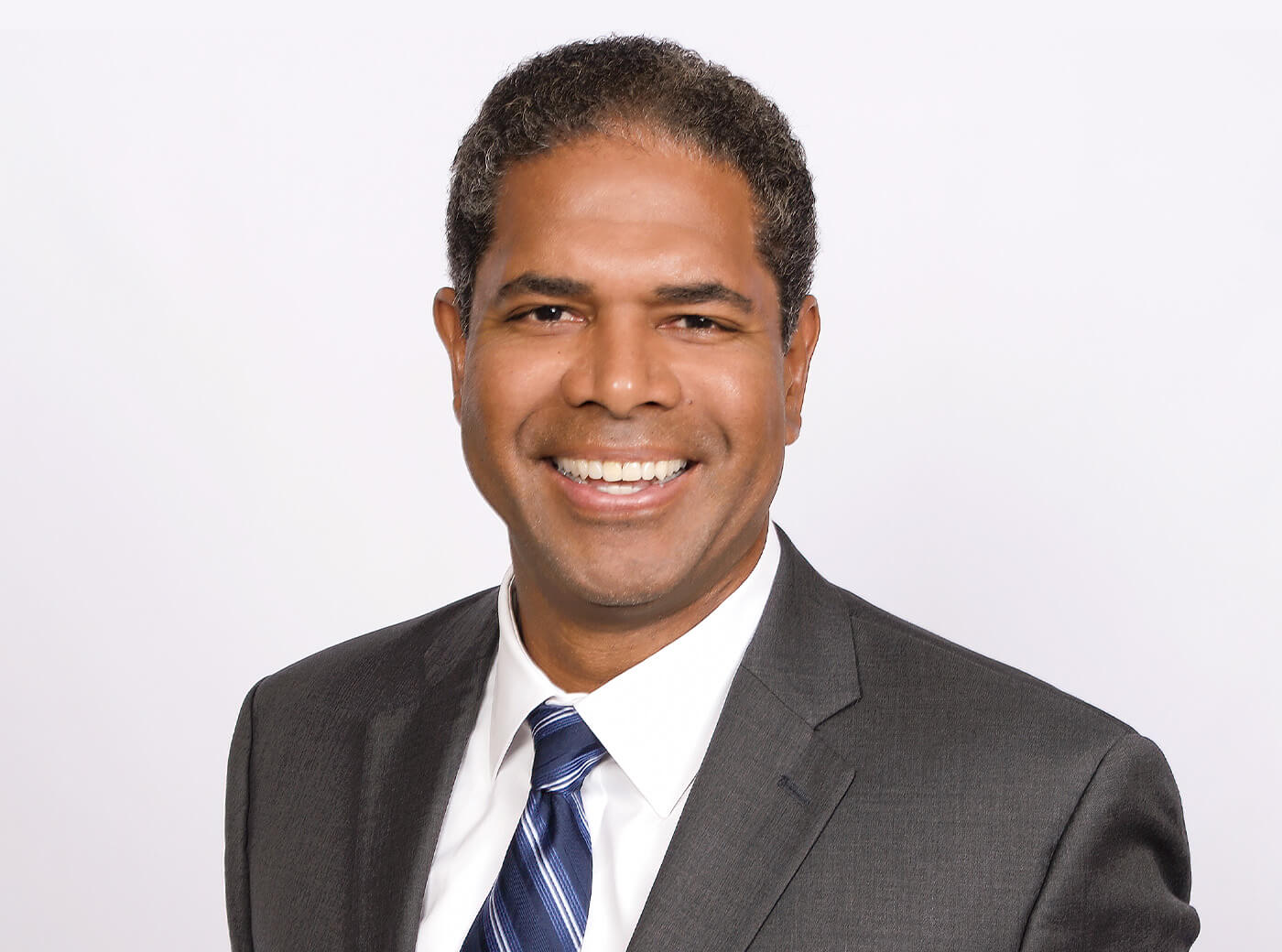 Man in a suit and tie for professional business headshot photos.